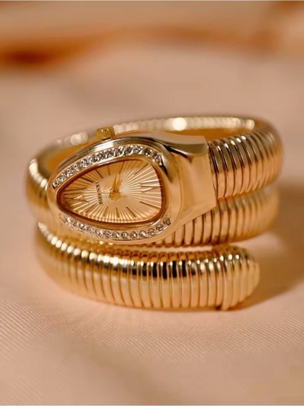 Serpenti Elegant Gold Wrap Watch